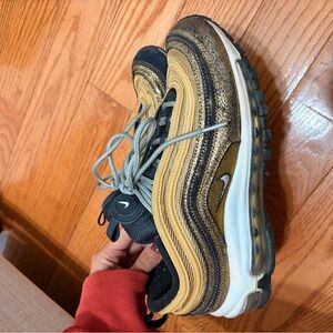 Nike Air Max 97 Sneakers in Black and Gold